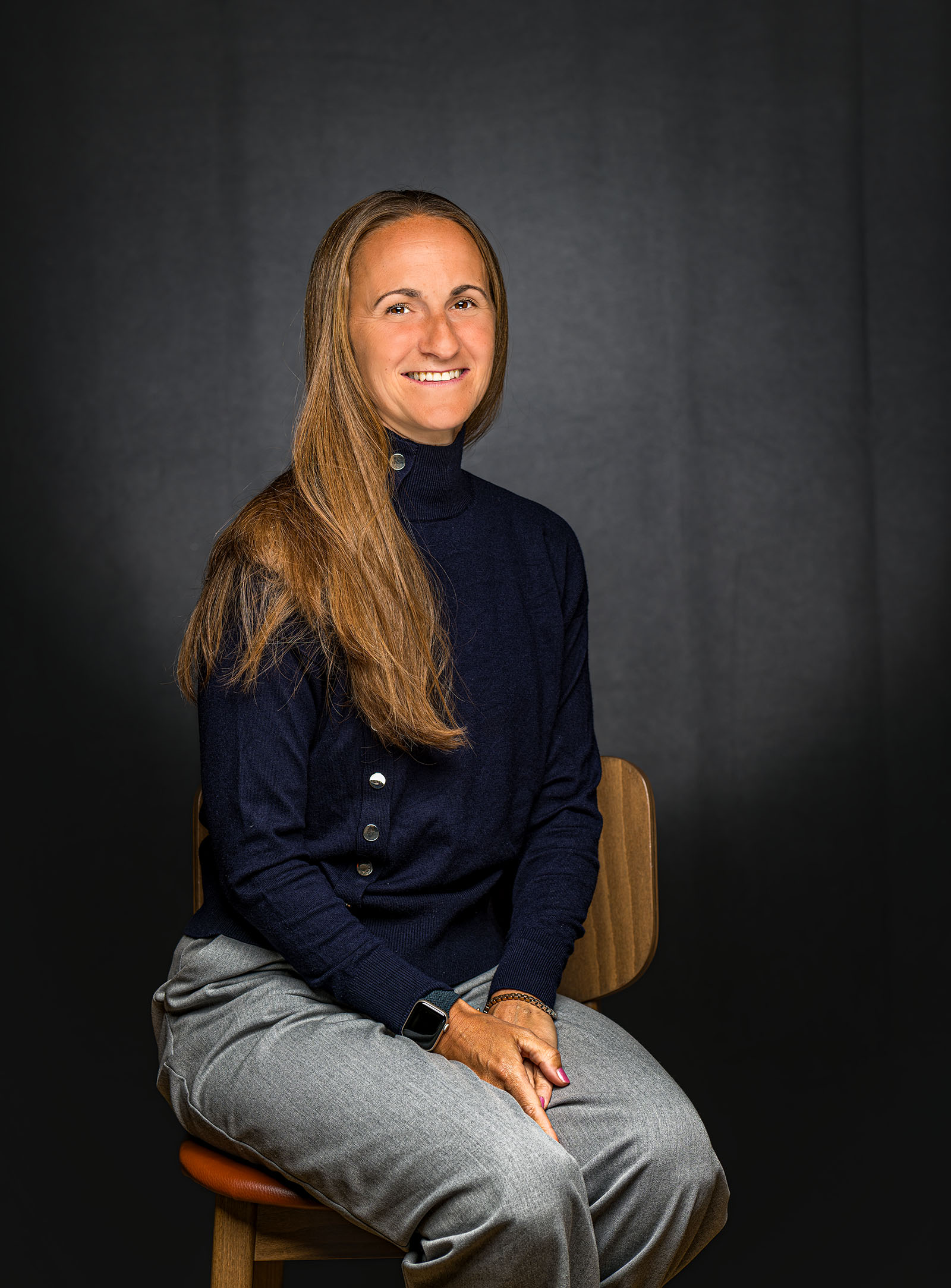 Relaxed seated business portrait of a woman