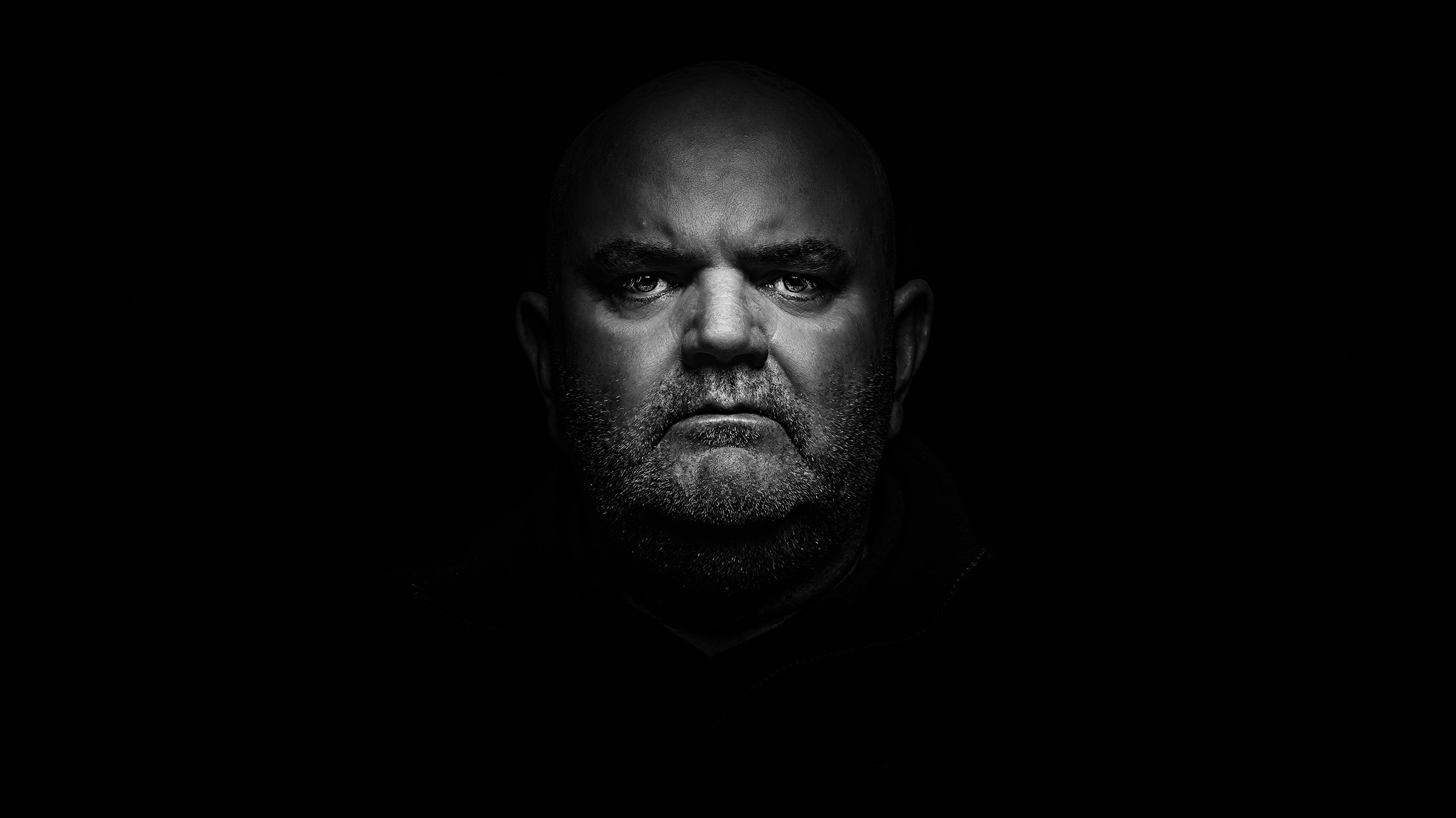 Black-and-white portrait of photographer Stephen Heggs
