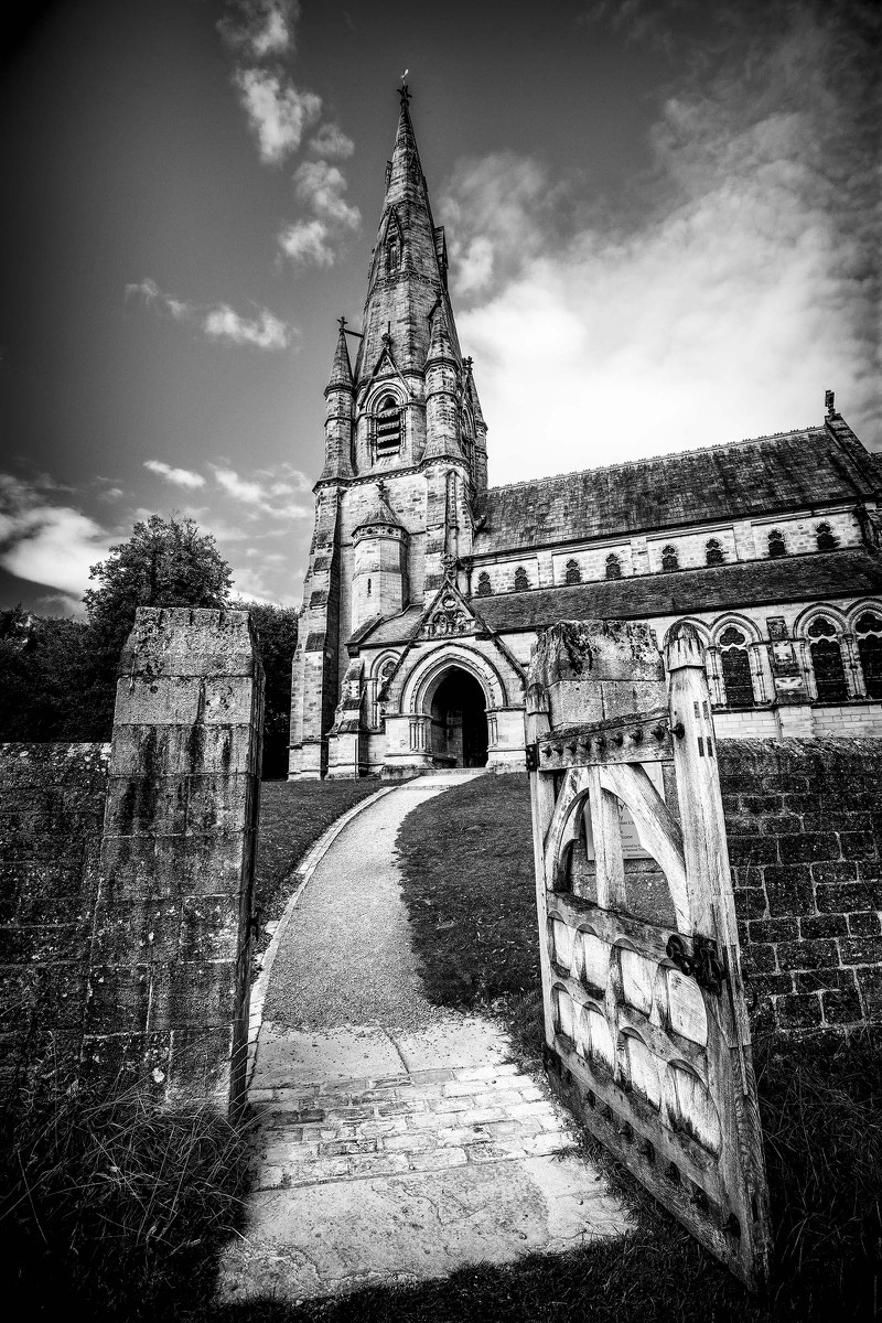 Curving path leading towards an ornate church entrance