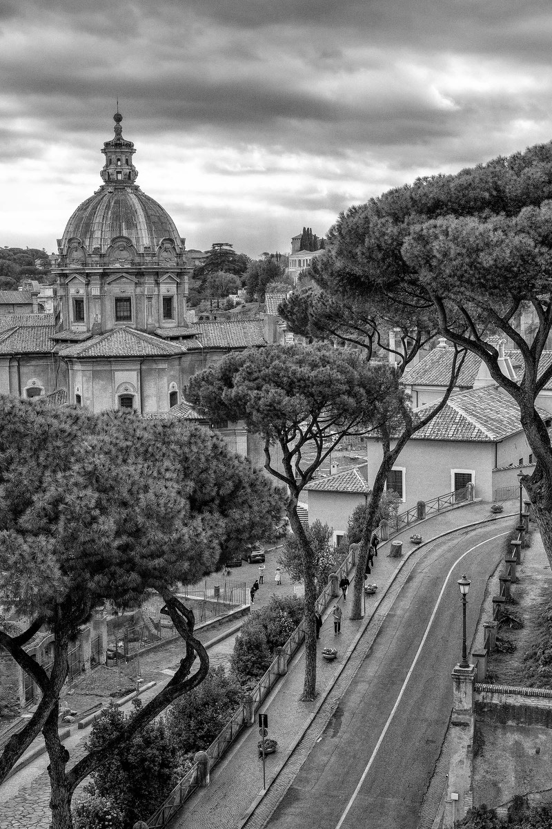 Elevated view across Rome towards a domed church